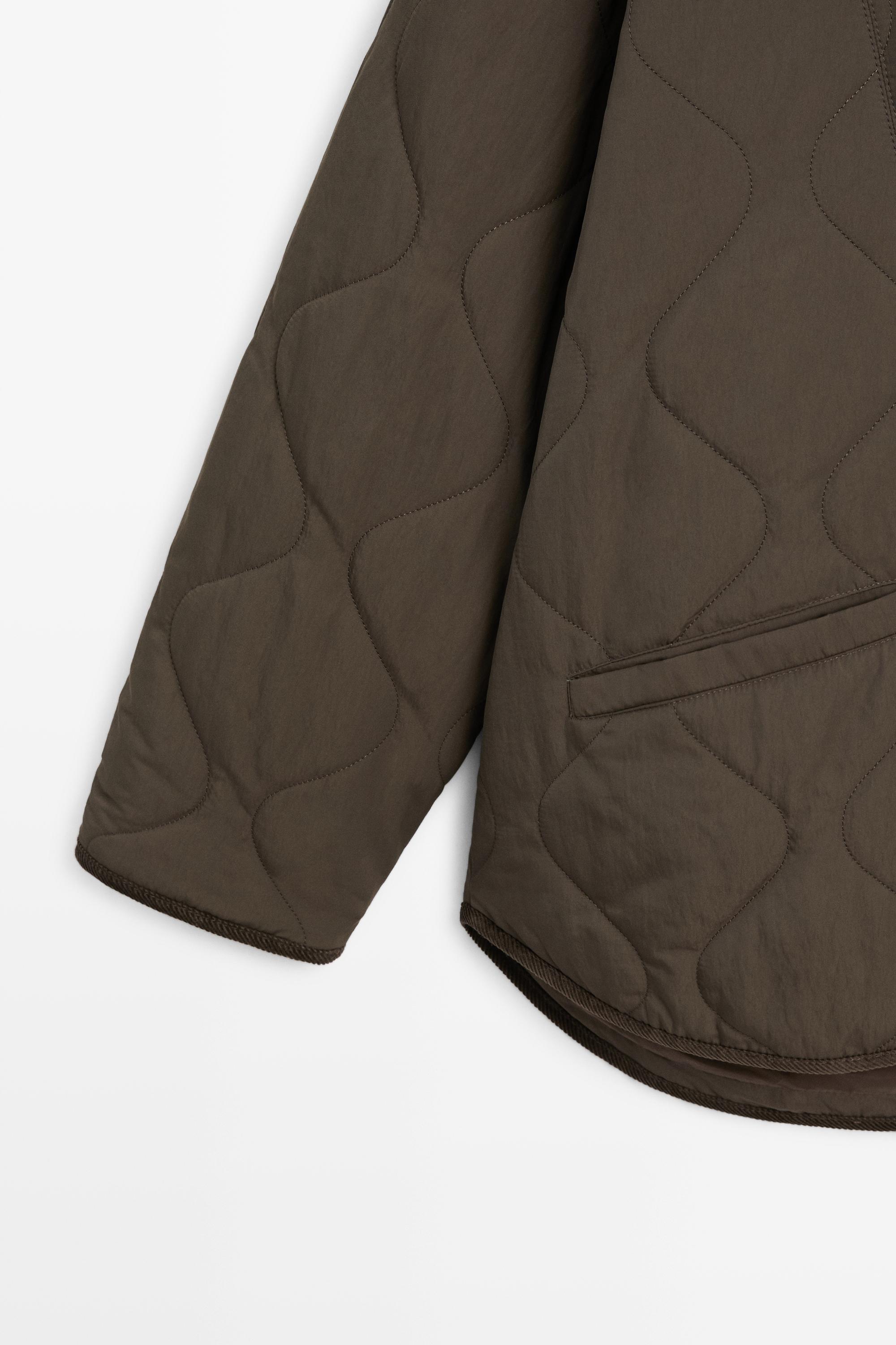 Veste à surpiqûres ondulées